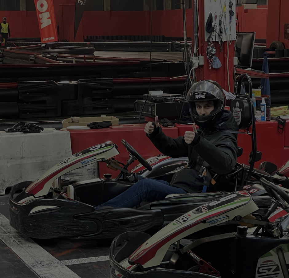 Bonsai employee Pablo (an F1 fan) in his carting bolide with thumbs up    